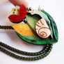 Laliblue : Plant Lover : Flower and snail bolo necklace