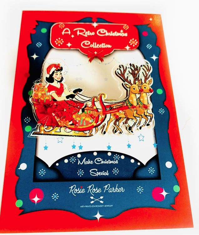 Rosie Rose Parker : A Christmas reindeer in a sleigh brooch