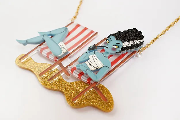 LaliBlue : Summerween : Elsa sitting in hammocks necklace