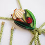 Laliblue : Plant Lover : Flower and ladybug bolo necklace