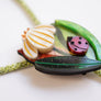 Laliblue : Plant Lover : Flower and ladybug bolo necklace