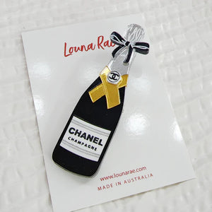Louna Rae : Emily in Paris : Chanel Champagne Brooch